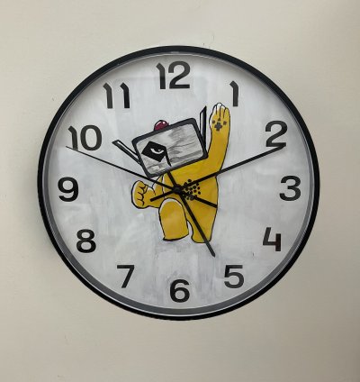 MEFCC mascot wall clock